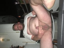 Shameless fat fag on his balcony