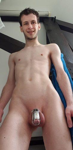 happy shaved nudist proud to be locked and show it to the world