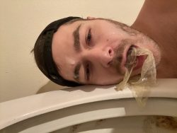 Toilet licking faggot covered in cum and used condoms