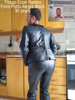 Exposed faggot in leather jacket and leather pants