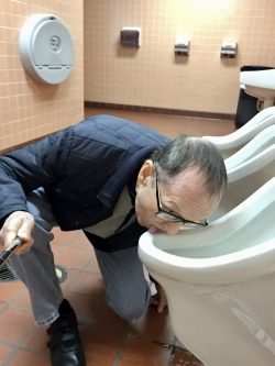 Public Urinal Licker