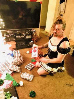Christmas Eve-2022-Erica Stacking the presents 🎁 all perfectly making good sissy maid.