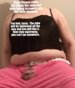 Poor Sissy Donna. Not only is she locked in stainless steel micro chastity, she is cathed with a ...
